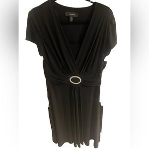 Black dress with decorative buckle